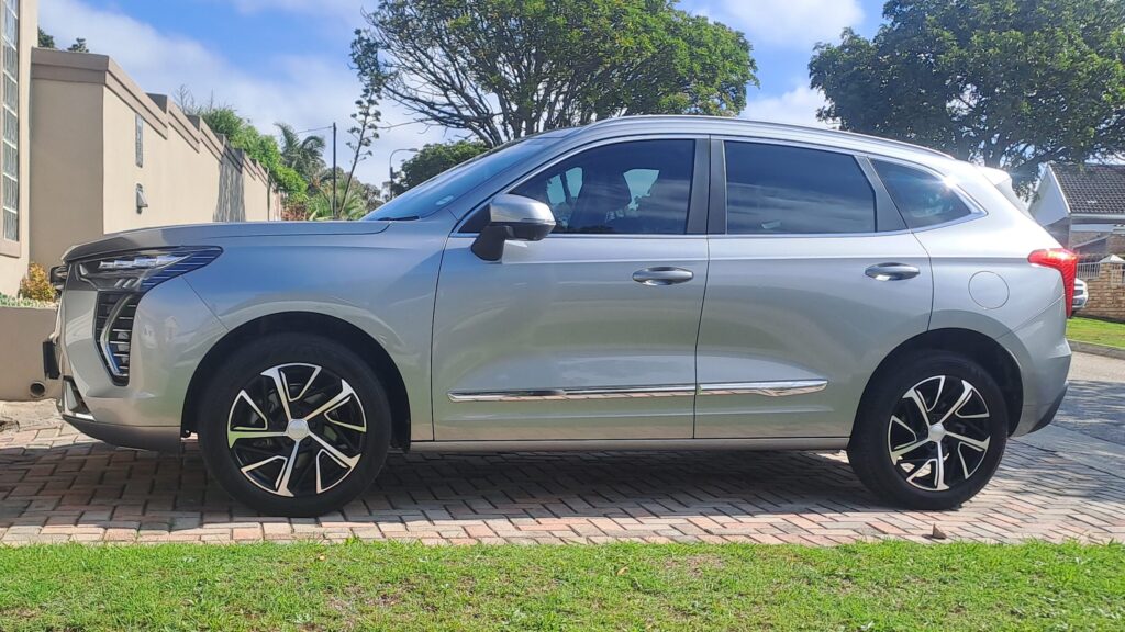 Everyone Blames China... But India Just Took 1 in 3 New Cars in Mzansi Silver Haval parked on a residential street in South Africa, showing the growing presence of Chinese cars in local neighbourhoods